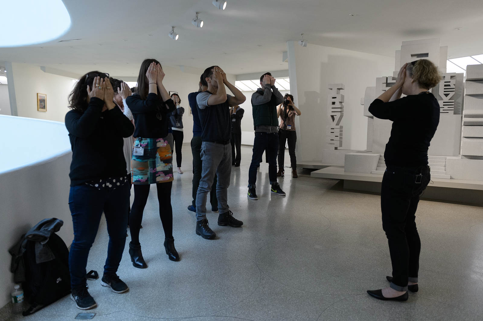 Visitors explore altenate ways of engagement with art. Guggenheim Museum